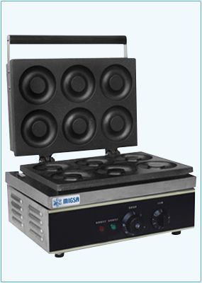 Donera tipo americano para 6 piezas en acero inoxidable, plato de fundición con teflón. Eléctrica: 120 V/ 60 Ciclos Potencia :1,800 W Temperatura: 50 a 300oC